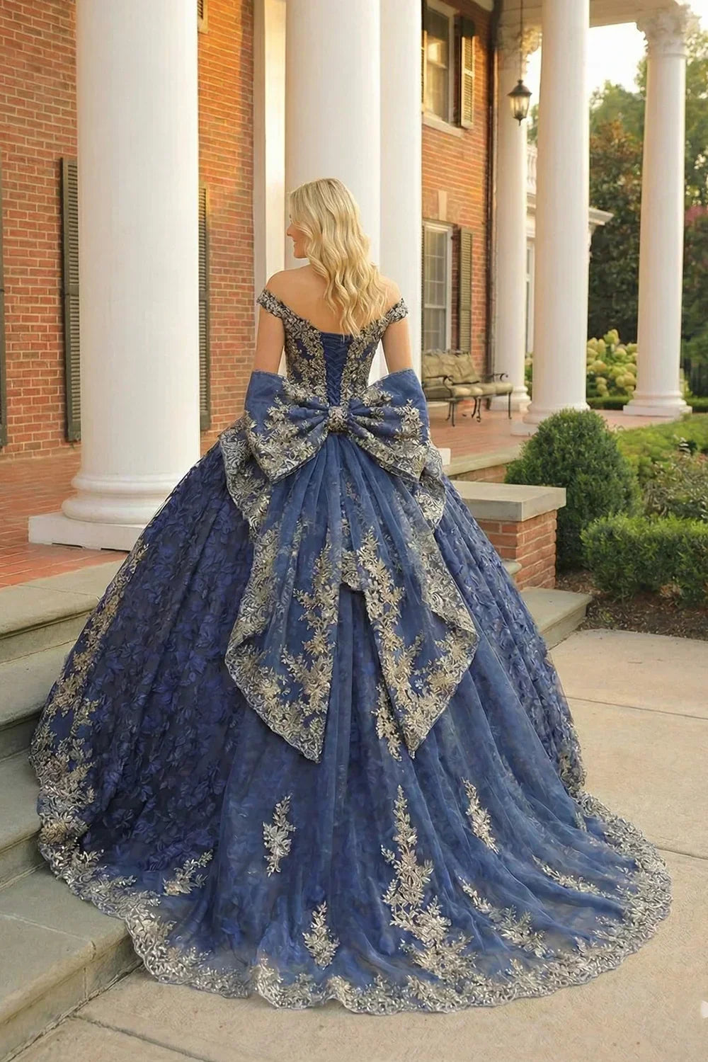 Carmina Layered Ruffled Ball Gown Cold Shoulder Quinceañera Dress With Floral Embroidery and Bow