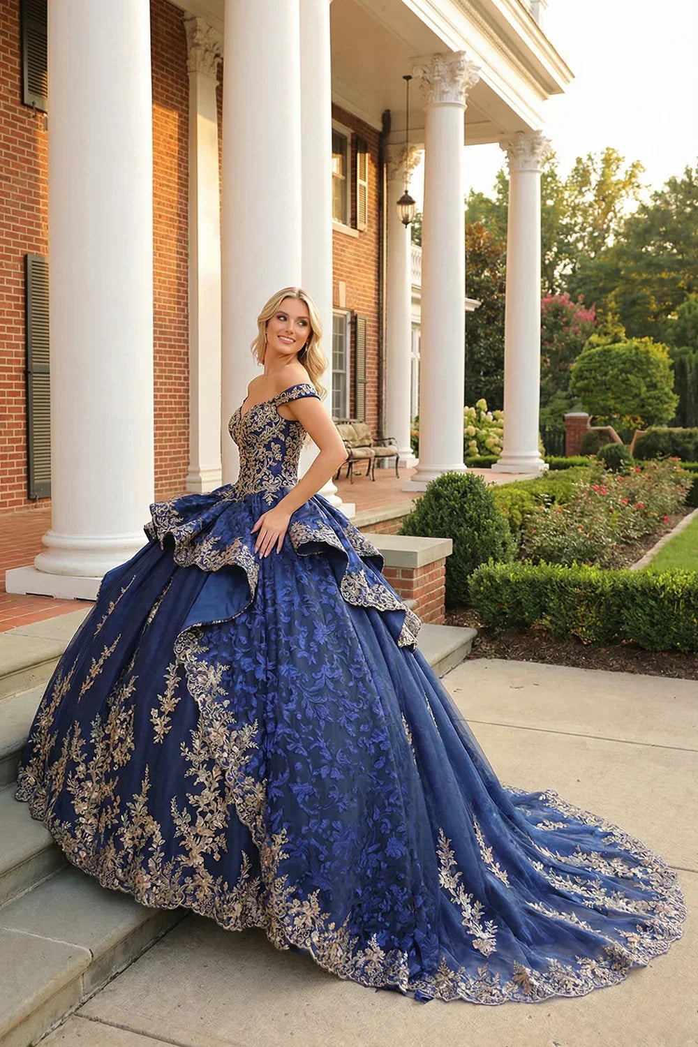 Carmina Layered Ruffled Ball Gown Cold Shoulder Quinceañera Dress With Floral Embroidery and Bow